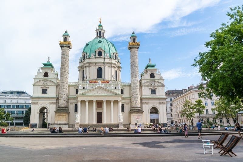 Karlskirche church facing a busy public square in Vienna